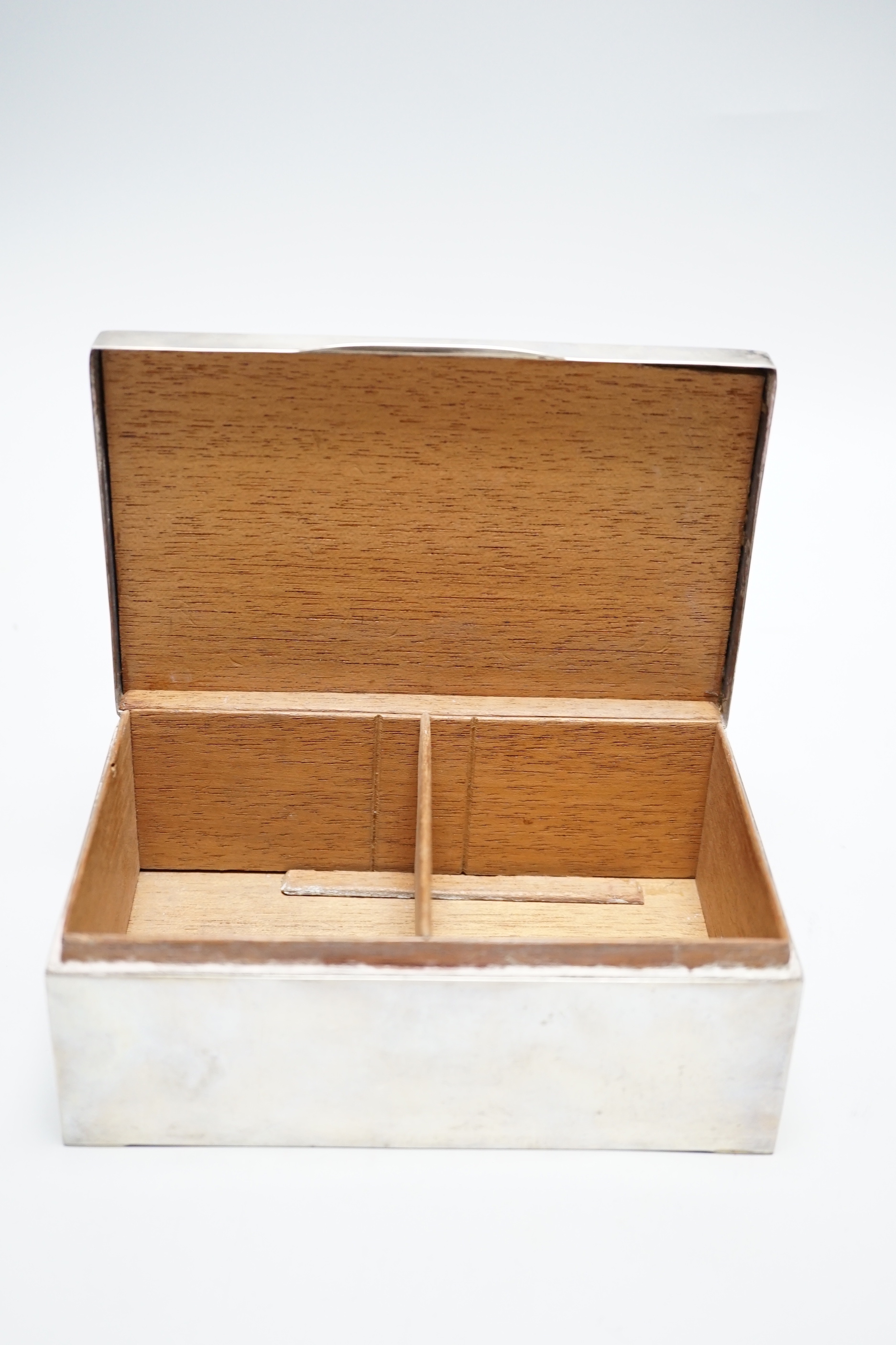 A George V silver mounted rectangular cigarette box, Martin Hall & Co Ltd, Birmingham, 1918, 16.7cm.